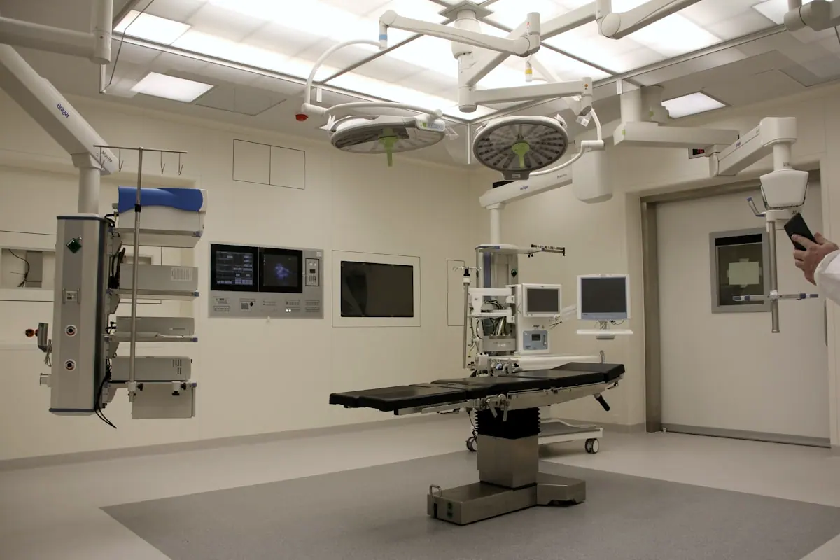 Clinical room with ceiling-mounted mechanical and electrical services